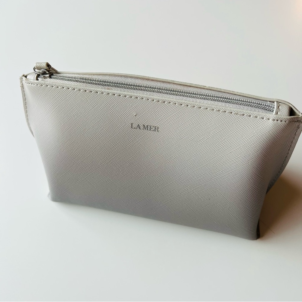 La Mer make up bag in silver grey , never been used , zipper make up bag